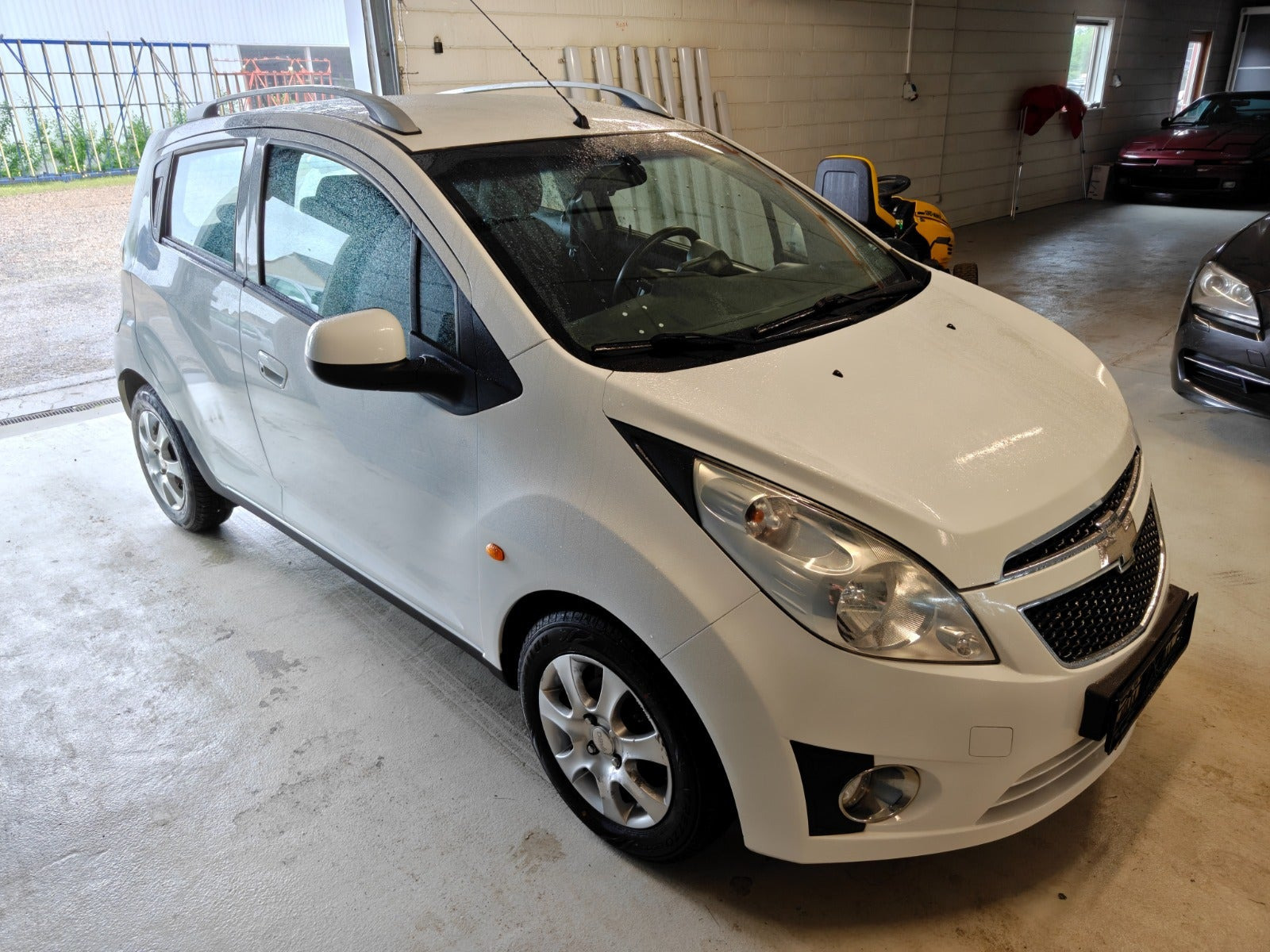 Gul Chevrolet Spark fra 2014