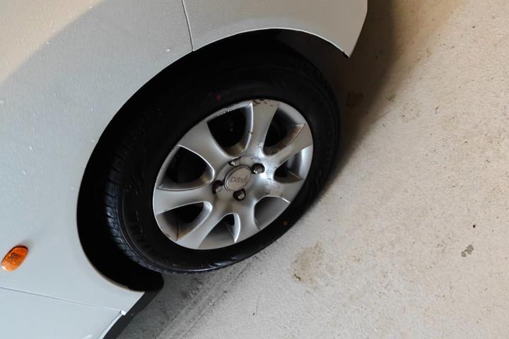 Gul Chevrolet Spark fra 2014