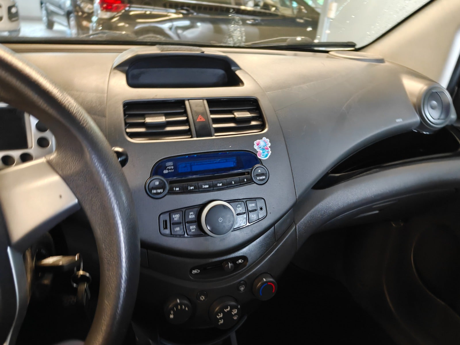 Gul Chevrolet Spark fra 2014