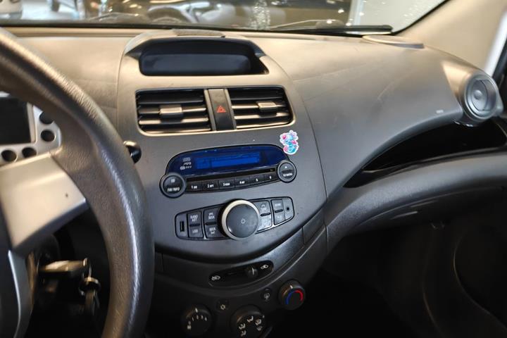 Gul Chevrolet Spark fra 2014