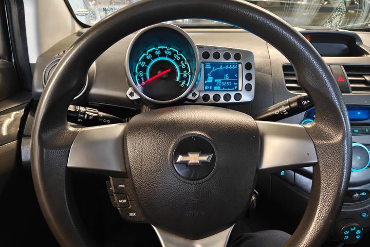 Gul Chevrolet Spark fra 2014