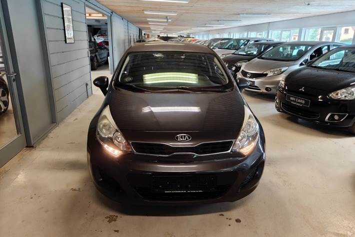 Gul Kia Rio fra 2013