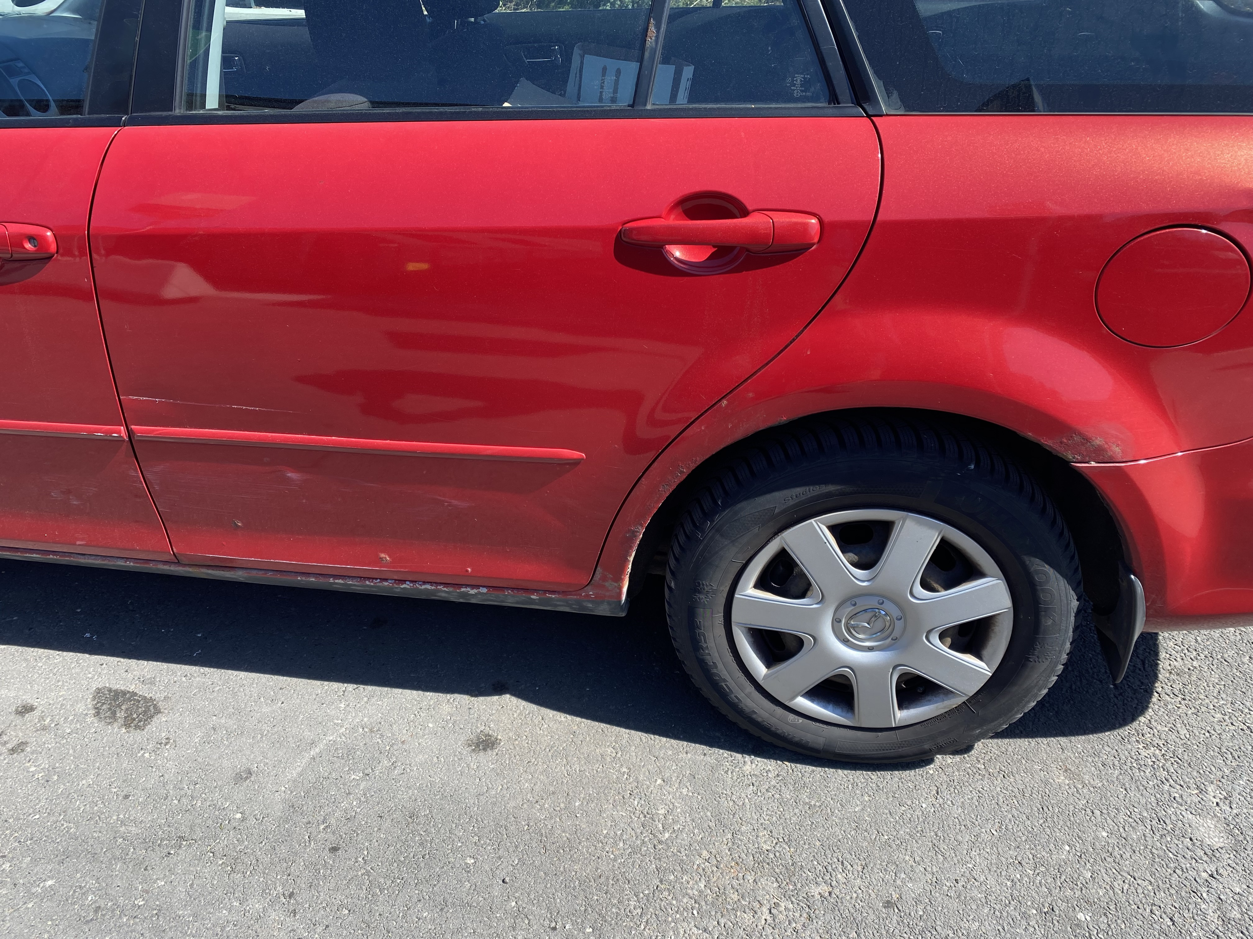 Rød Mazda 6 fra 2001