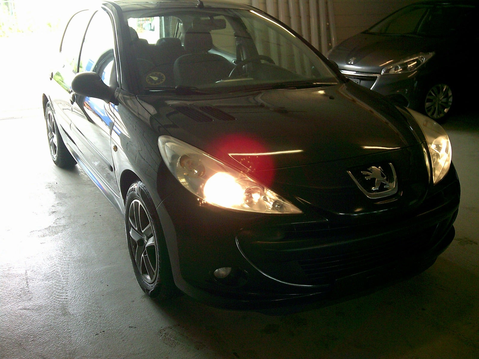 Gul Peugeot 206+ fra 2011