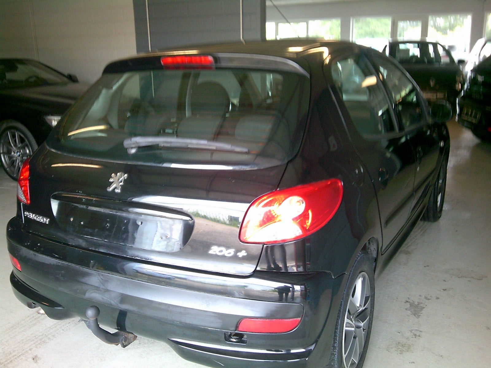 Gul Peugeot 206+ fra 2011