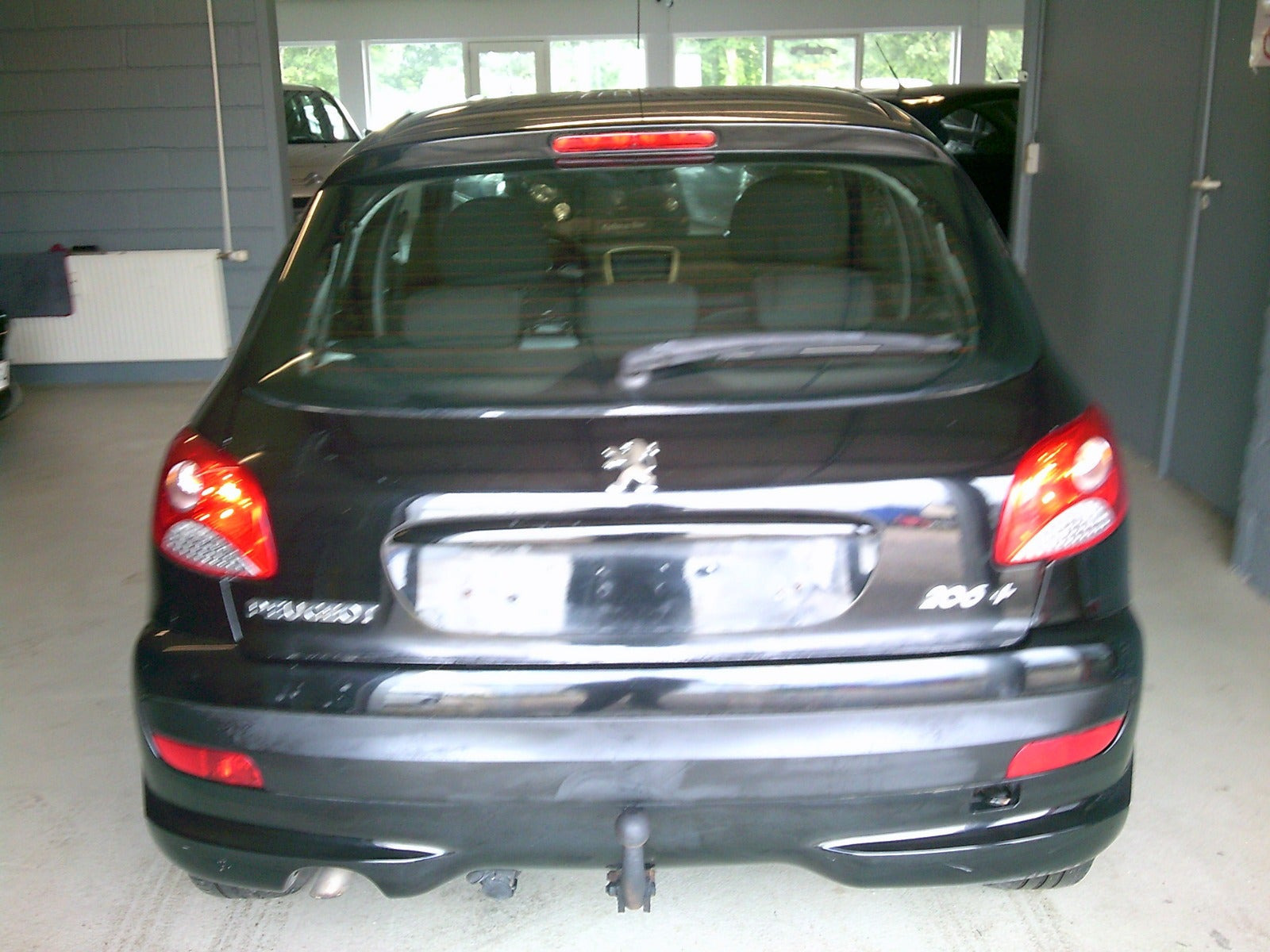 Gul Peugeot 206+ fra 2011