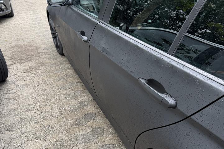 Sort BMW 320 fra 2007