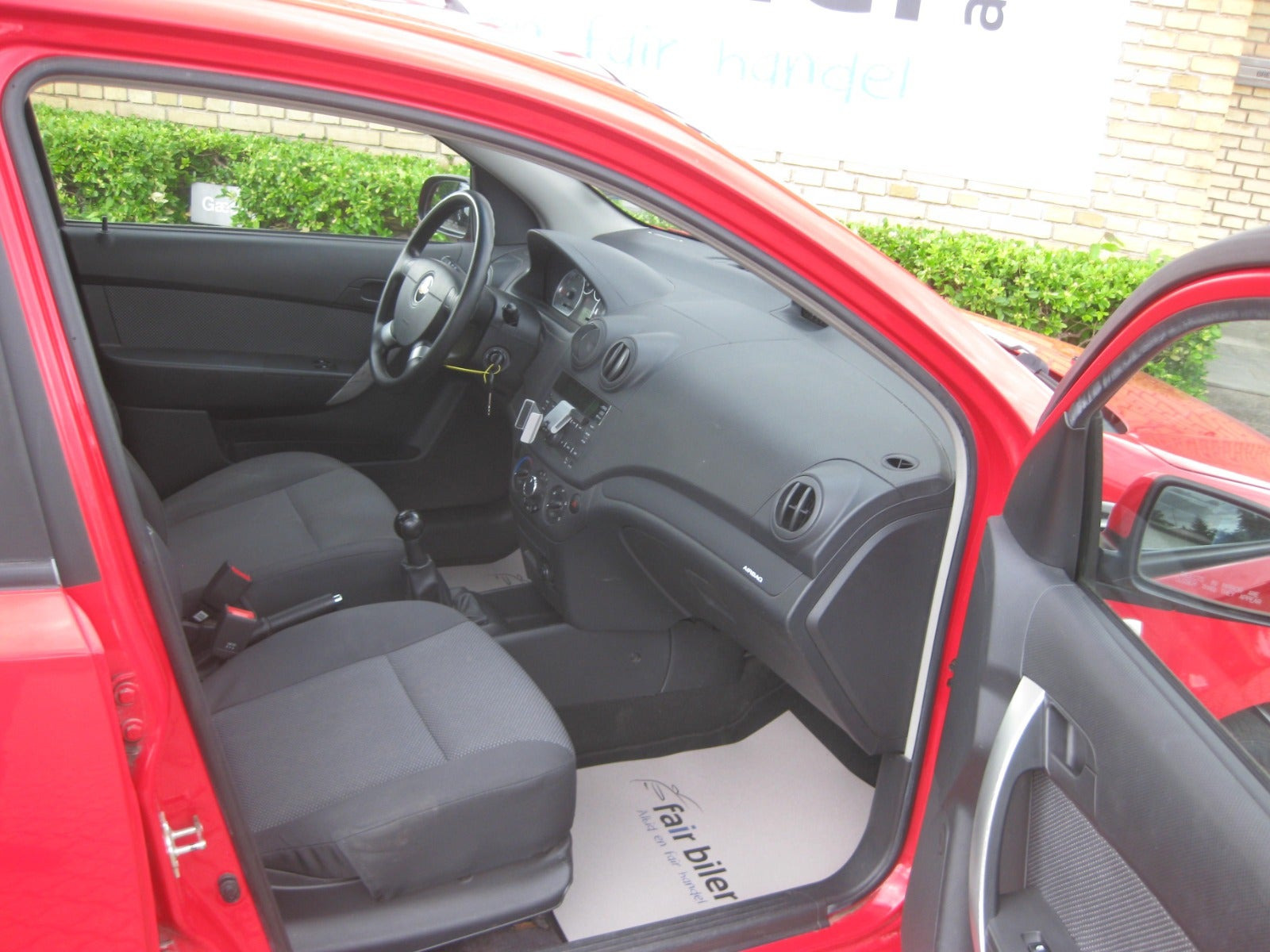 Rød Chevrolet Aveo fra 2010