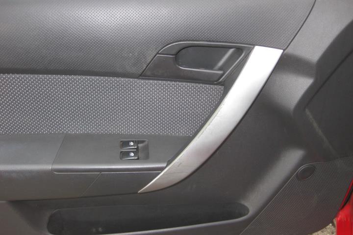 Rød Chevrolet Aveo fra 2010
