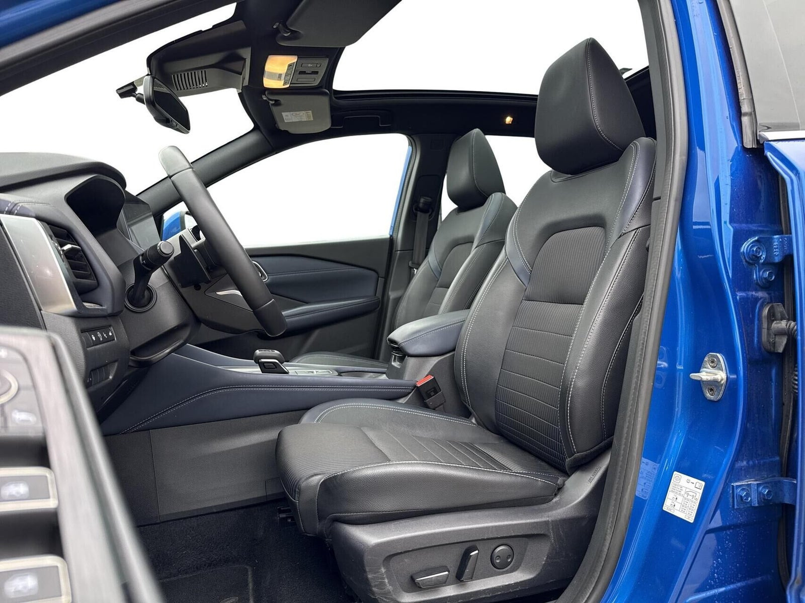 Blå Nissan Qashqai fra 2023