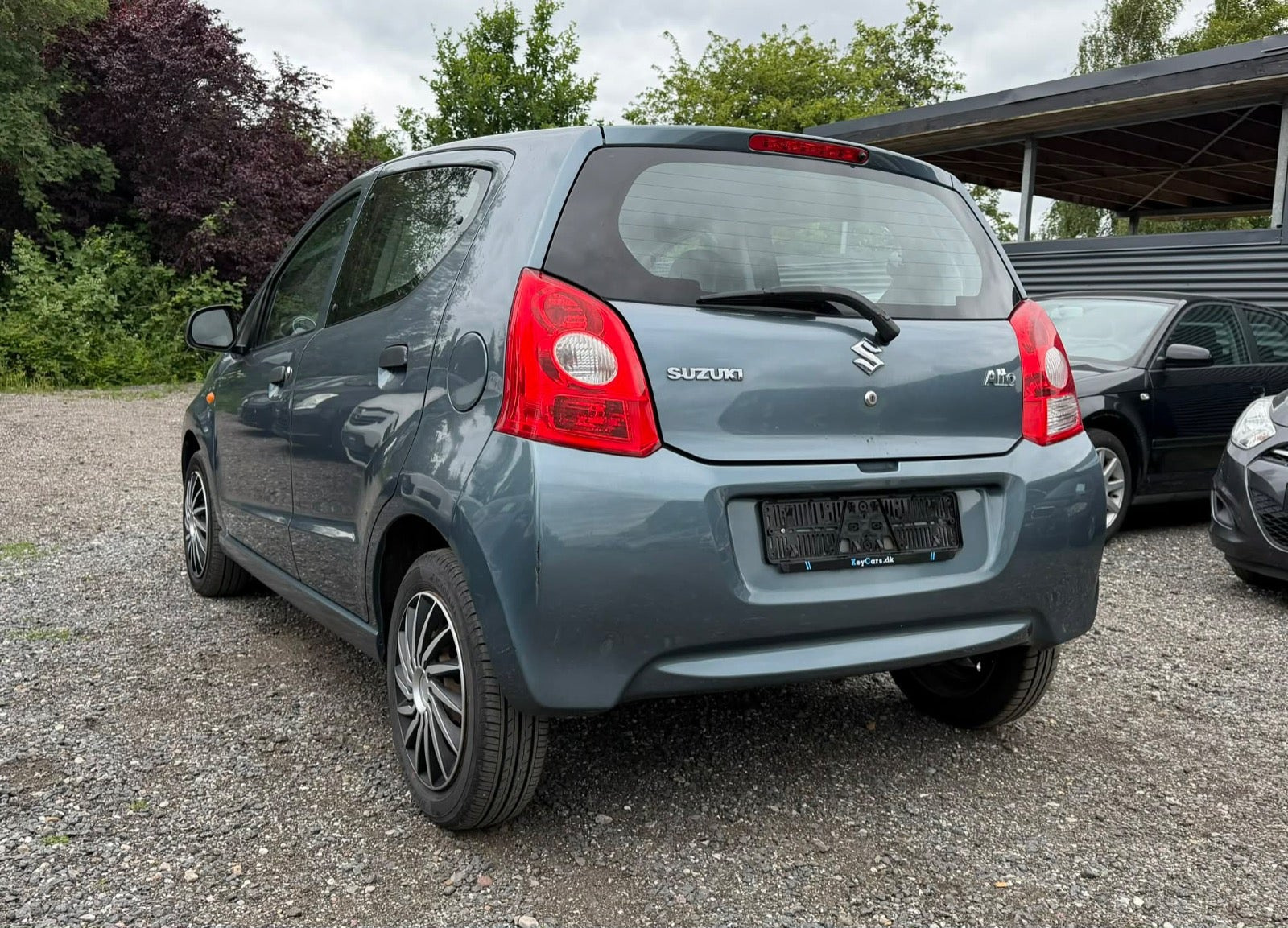 Grå Suzuki Alto fra 2009