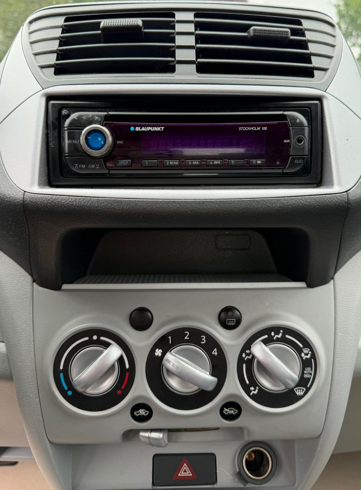 Grå Suzuki Alto fra 2009