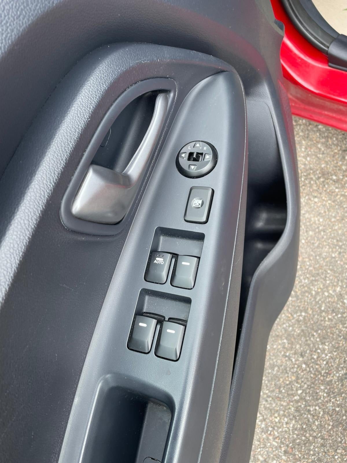 Rød Kia Rio fra 2014