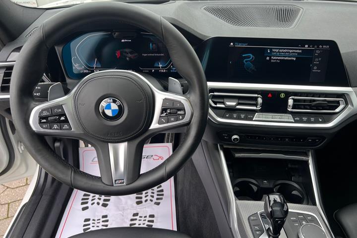 Hvid BMW 330e fra 2019