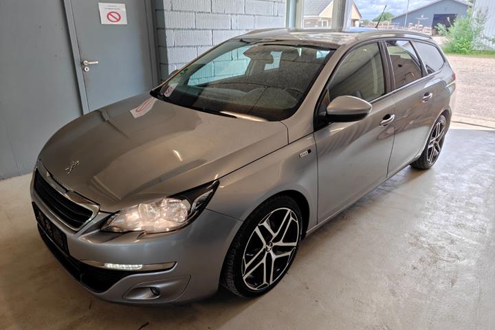 Gul Peugeot 308 fra 2016