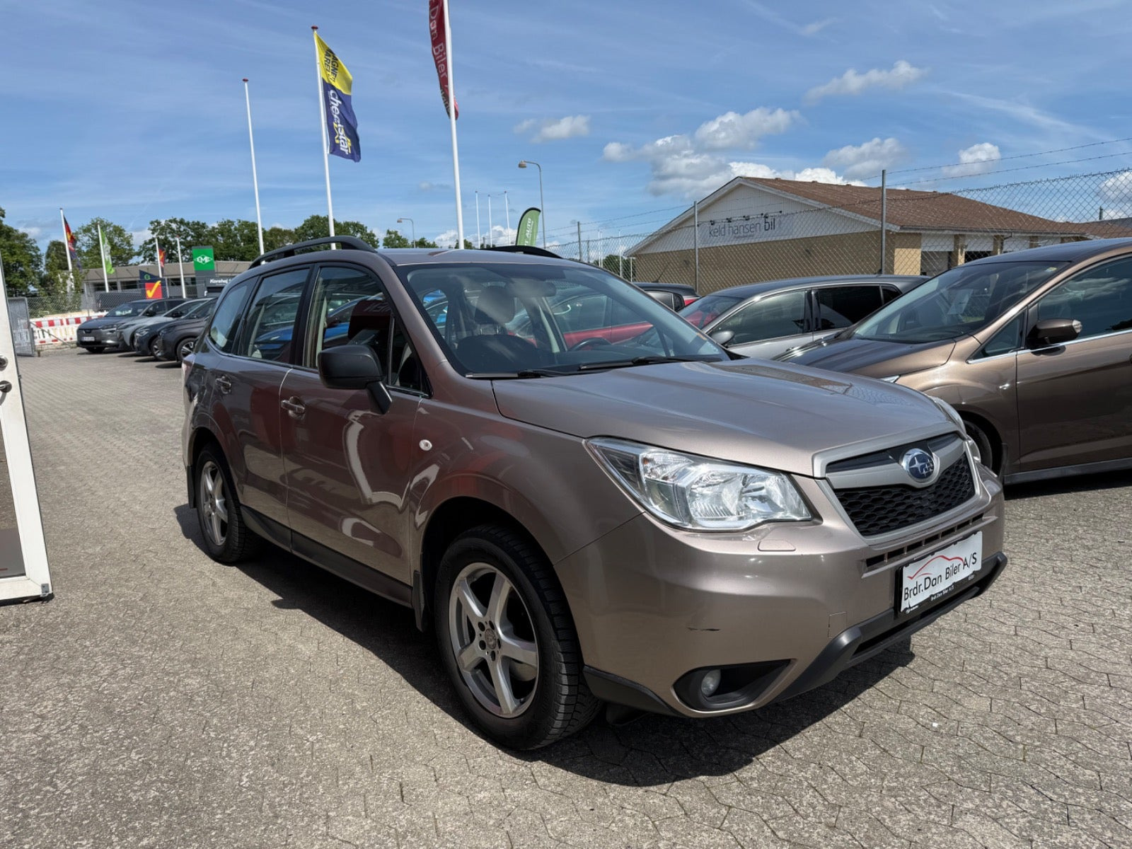 Beige Subaru Forester fra 2016