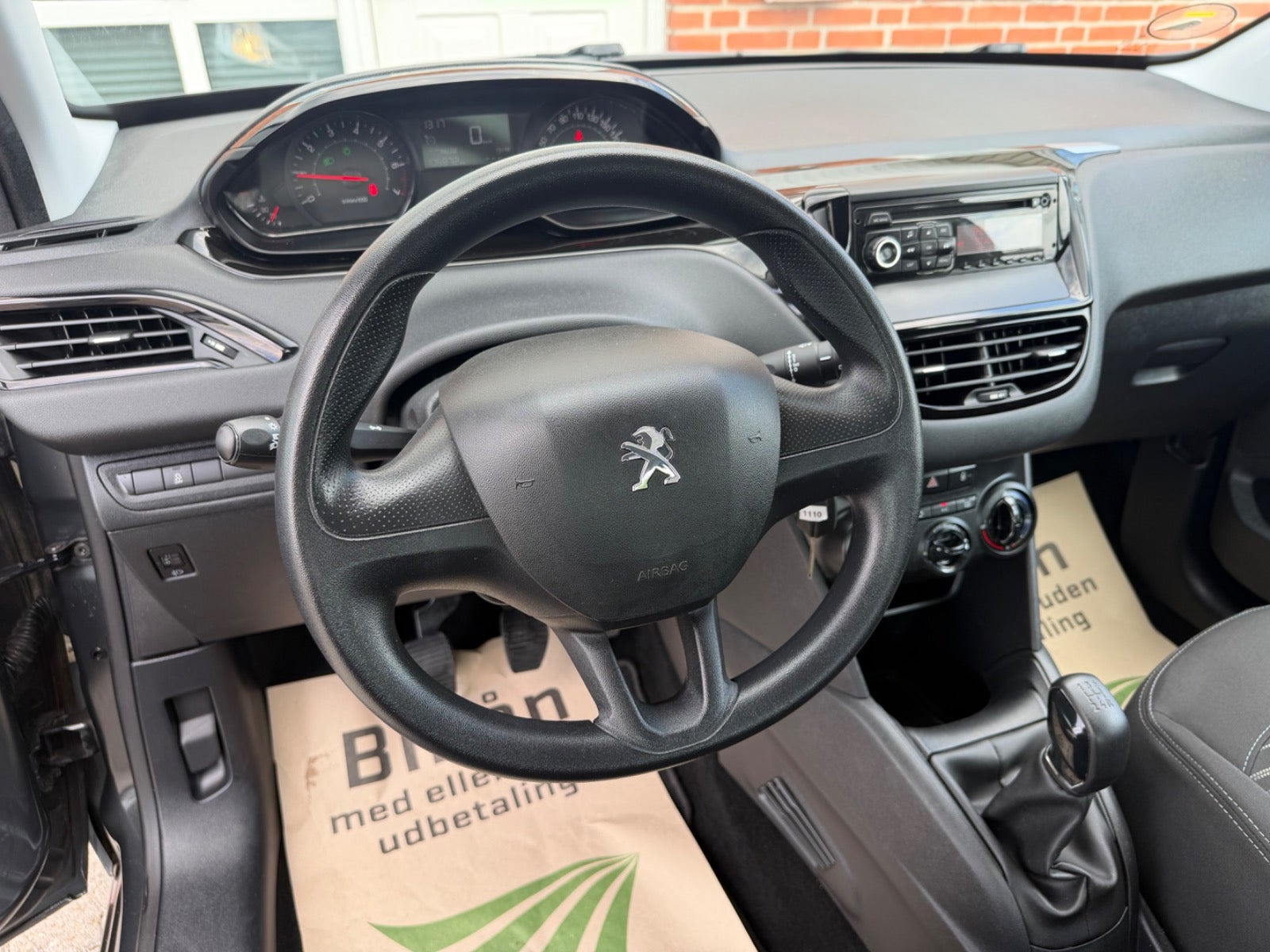 Grå Peugeot 208 fra 2013
