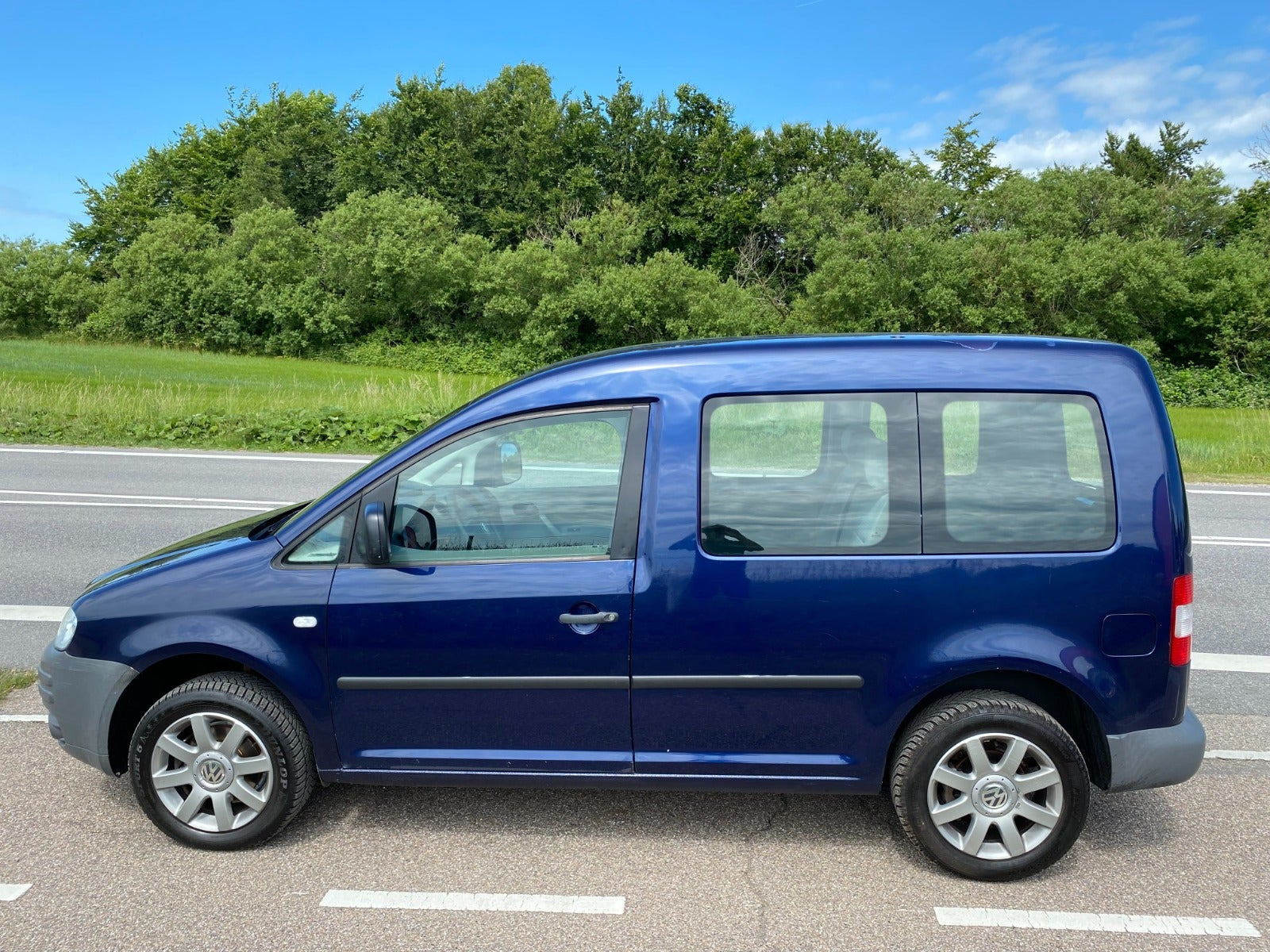 Blå VW Caddy fra 2005