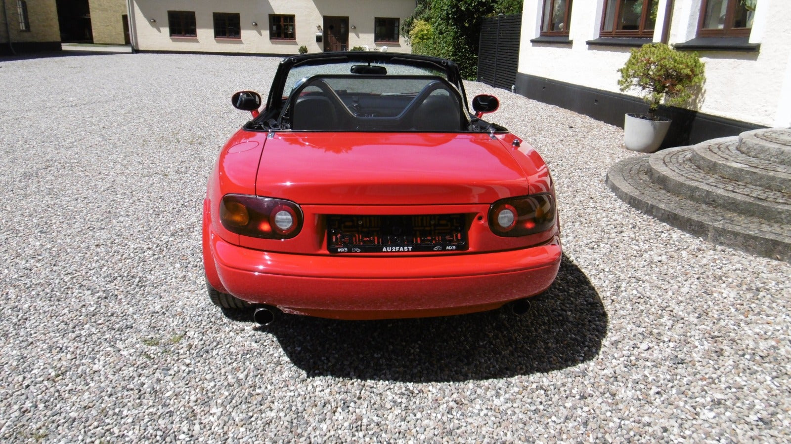 Rød Mazda MX-5 fra 1994