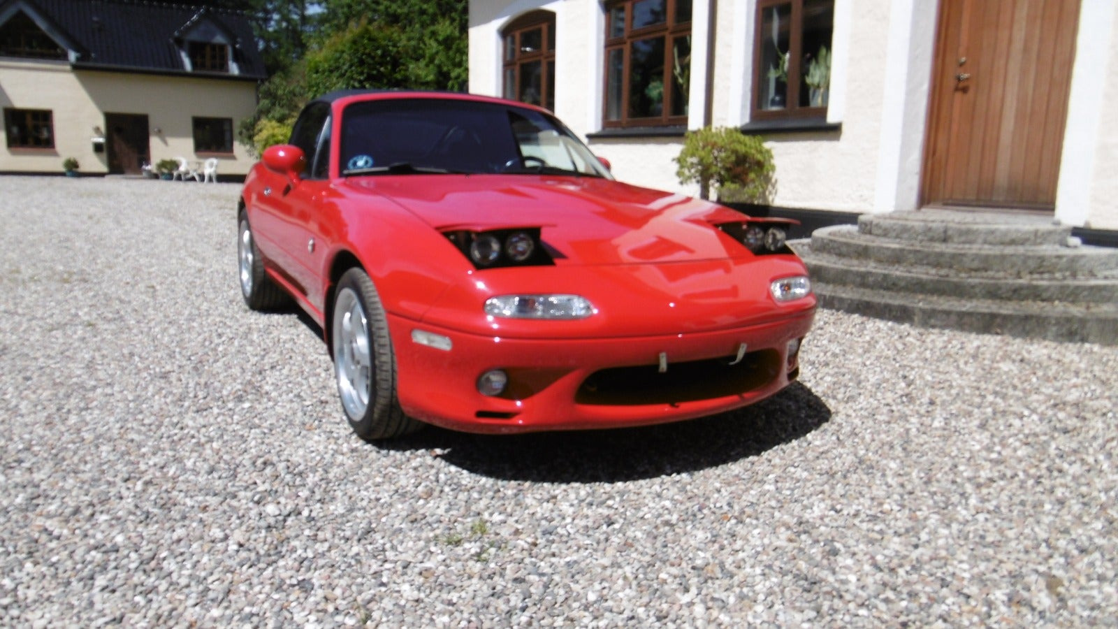 Rød Mazda MX-5 fra 1994
