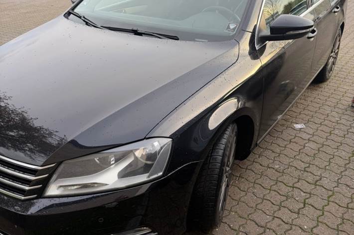 Sort VW Passat fra 2013