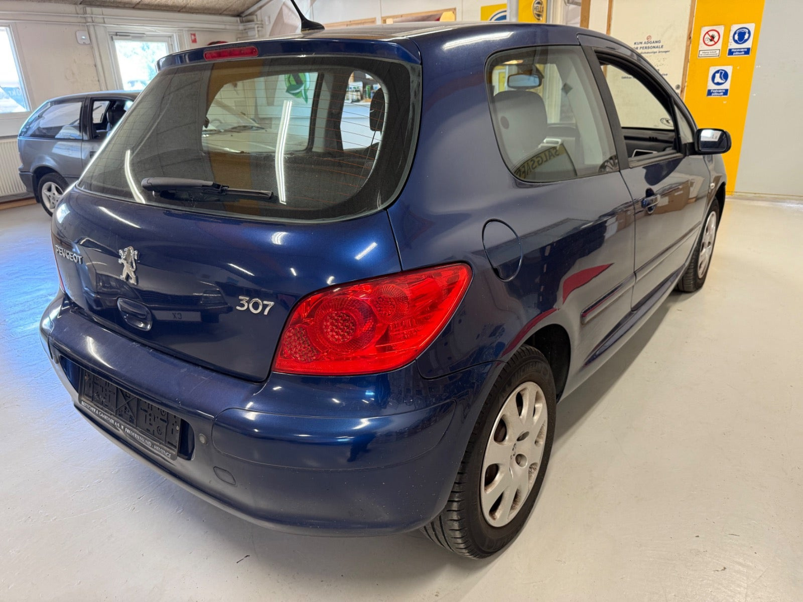 Blå Peugeot 307 fra 2006