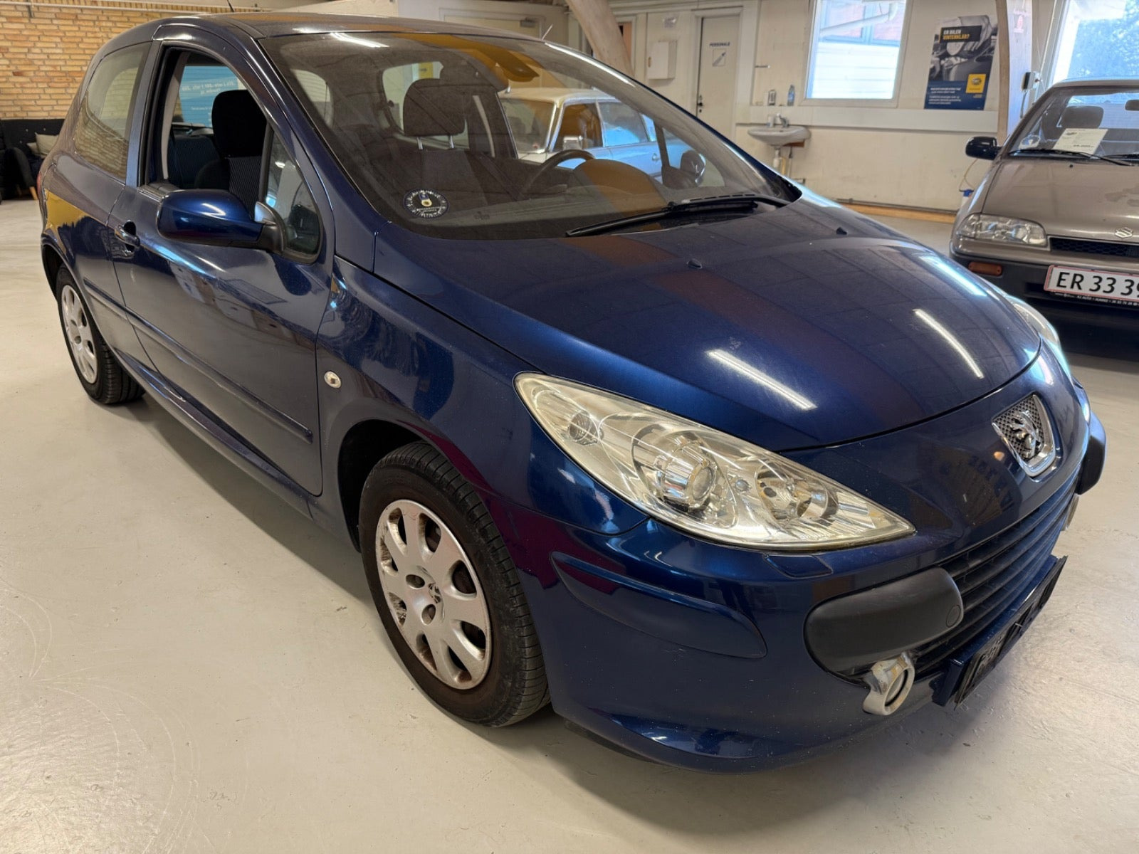 Blå Peugeot 307 fra 2006