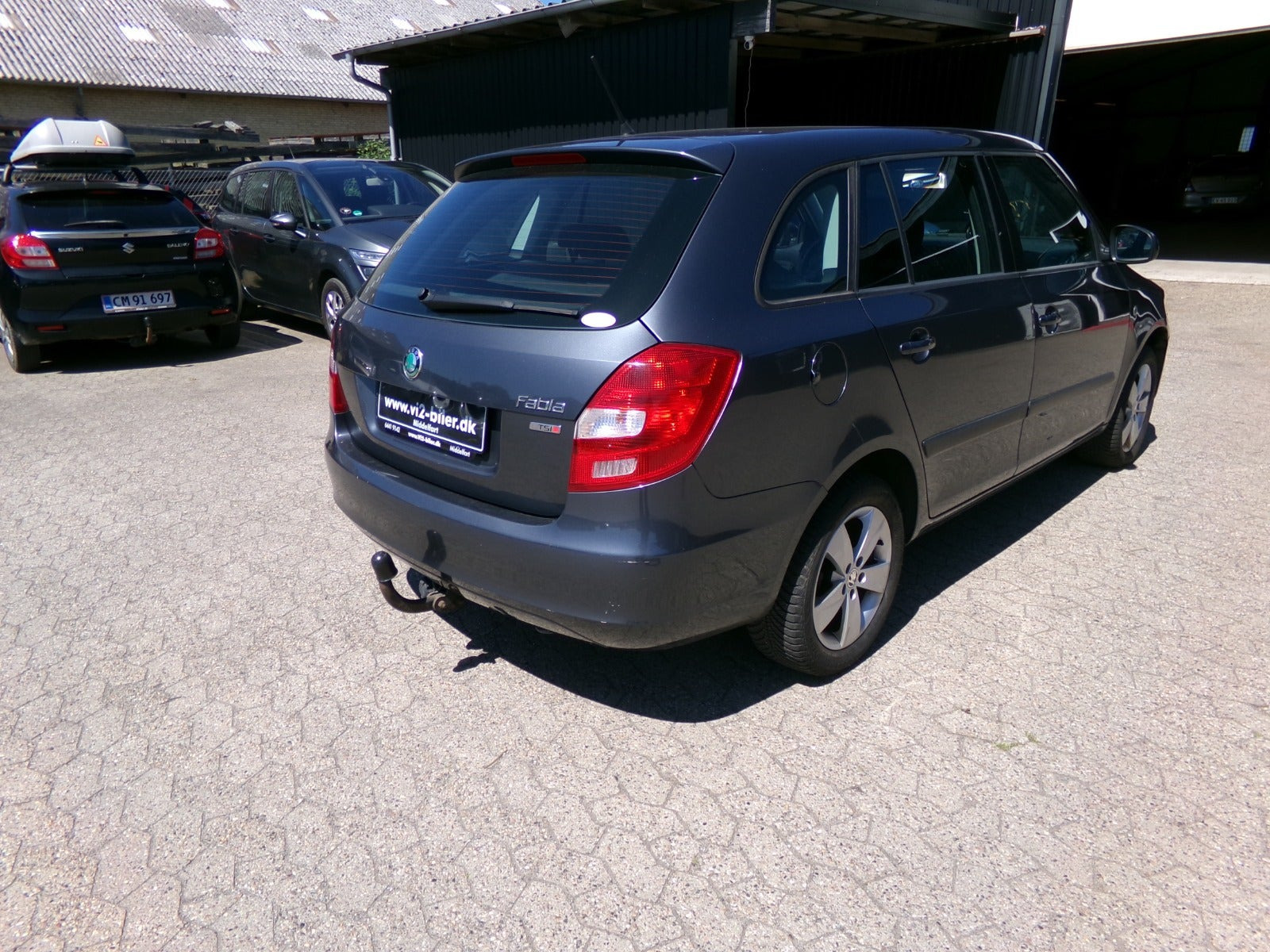 Grå Skoda Fabia fra 2013