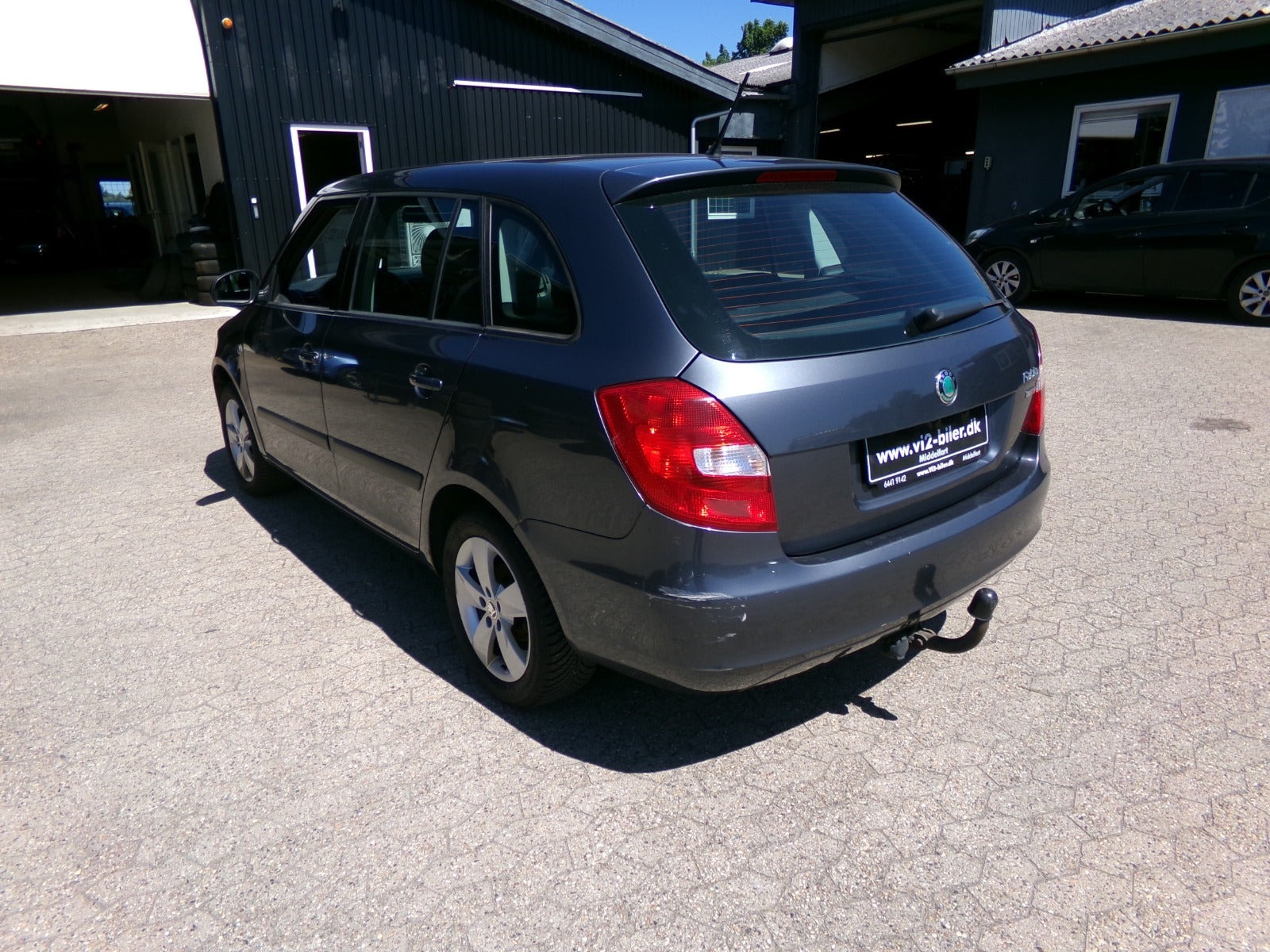 Grå Skoda Fabia fra 2013