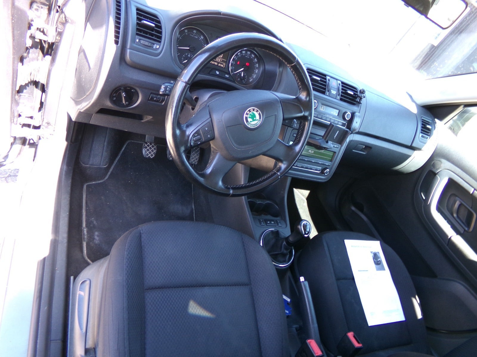 Grå Skoda Fabia fra 2013