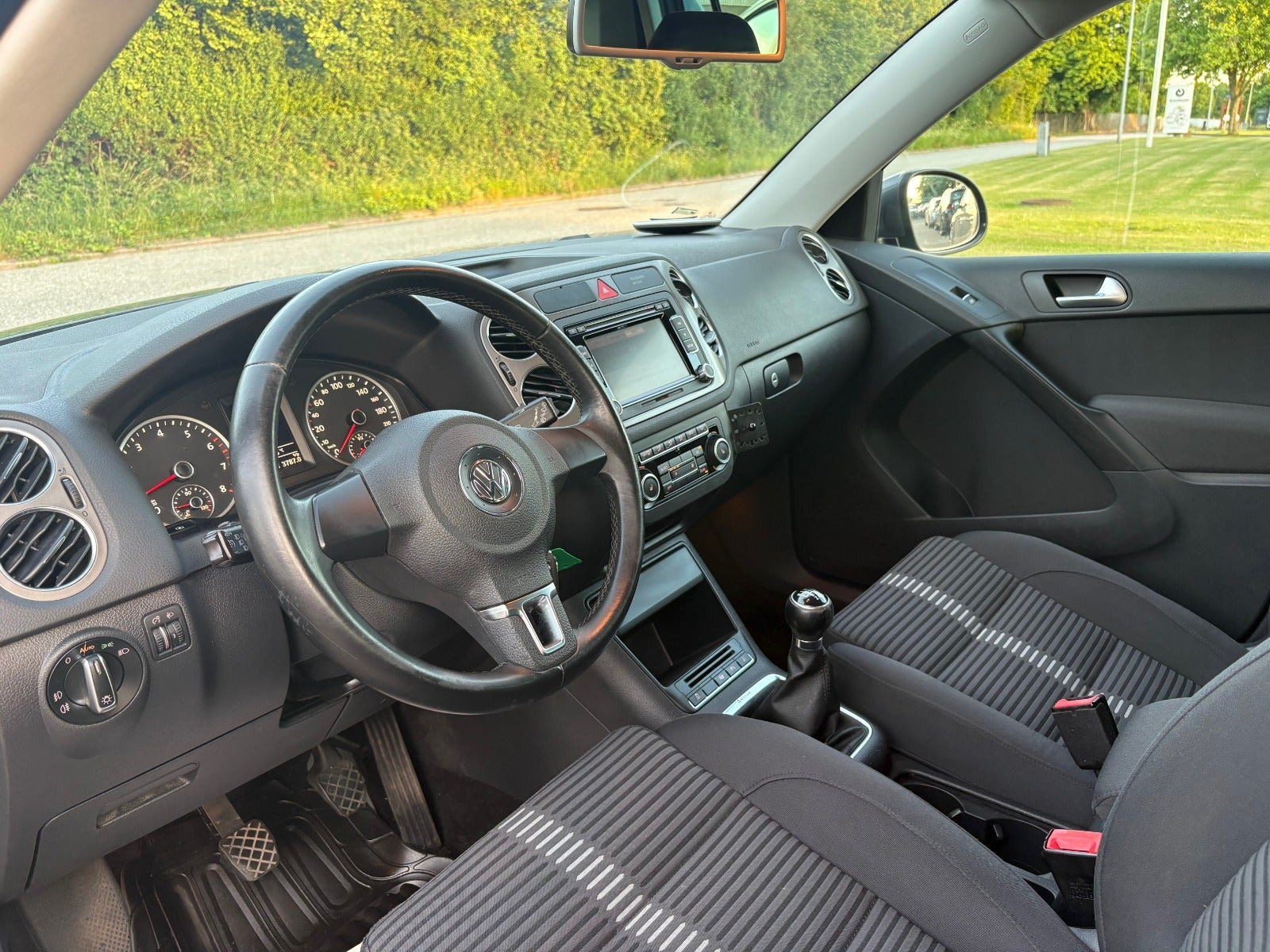 Grå VW Tiguan fra 2011