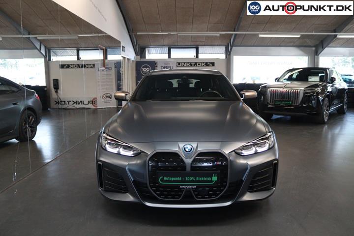 Orange BMW i4 fra 2024
