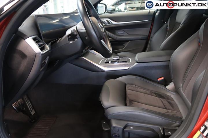 Orange BMW i4 fra 2024