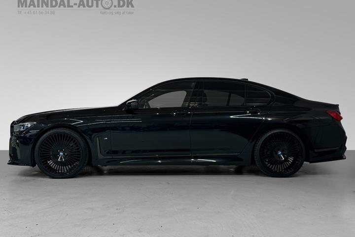 Grøn BMW 745e fra 2019