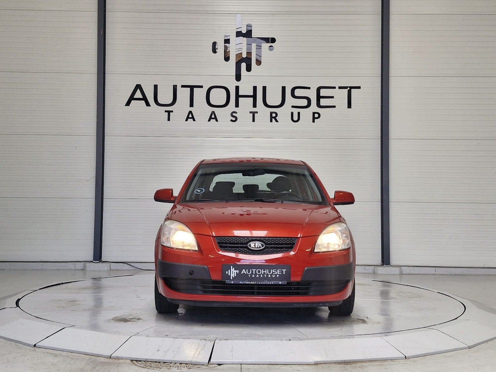 Rød Kia Rio fra 2007