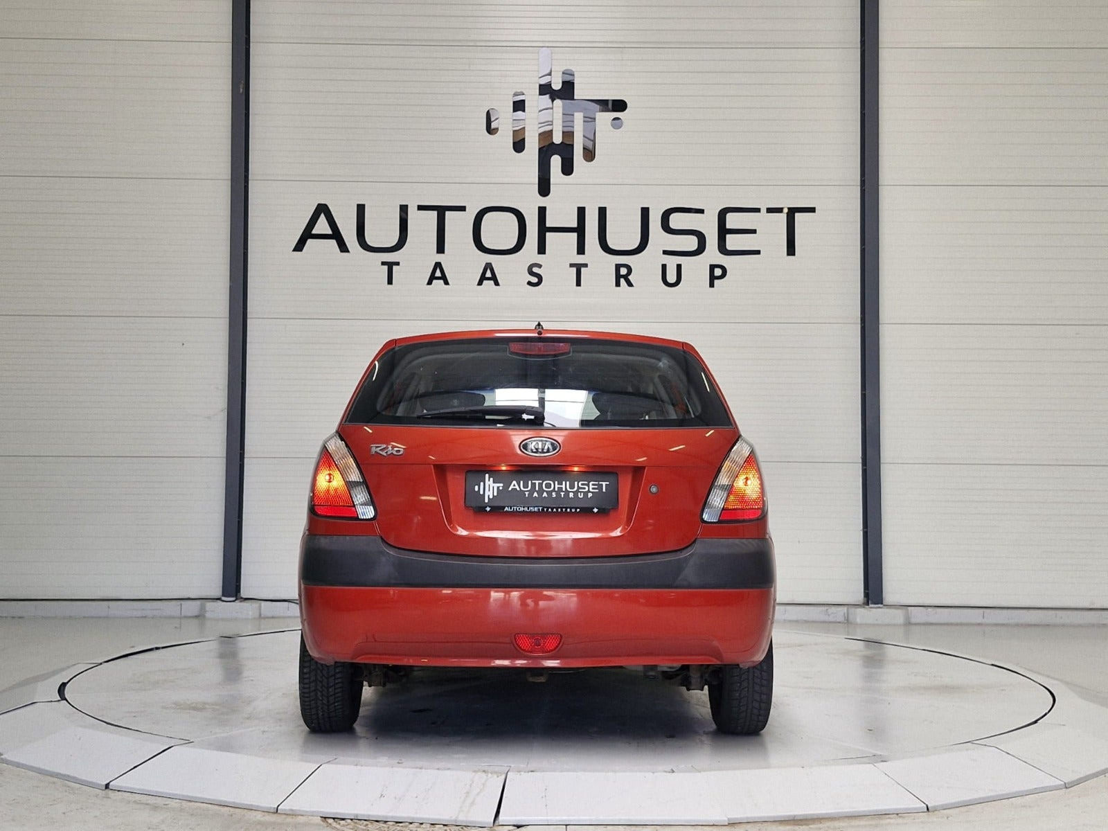Rød Kia Rio fra 2007