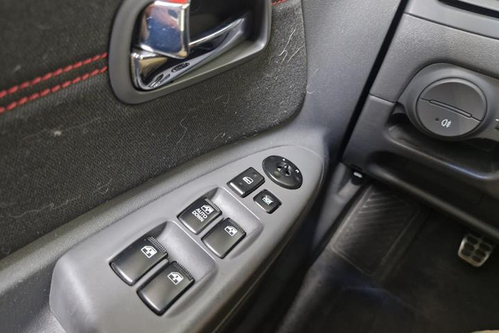 Rød Kia Rio fra 2007