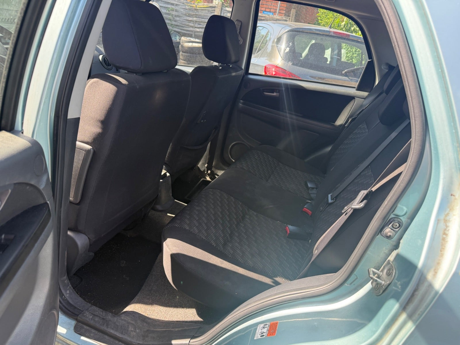 Blå Suzuki SX4 fra 2008
