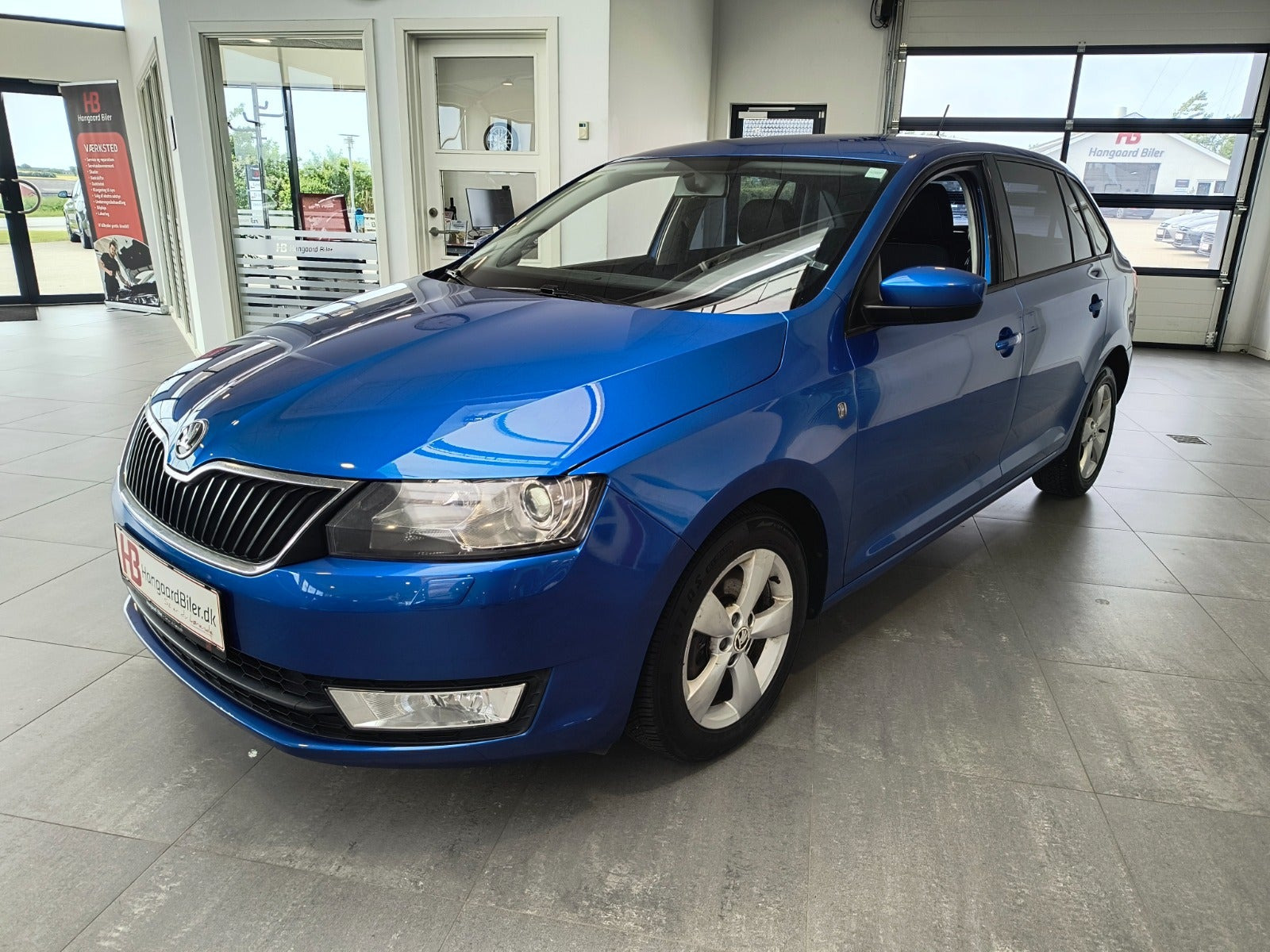 Blå Skoda Rapid fra 2014