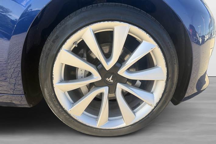 Blå Tesla Model 3 fra 2019