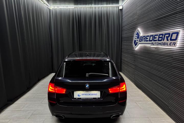 Blå BMW 528i fra 2012