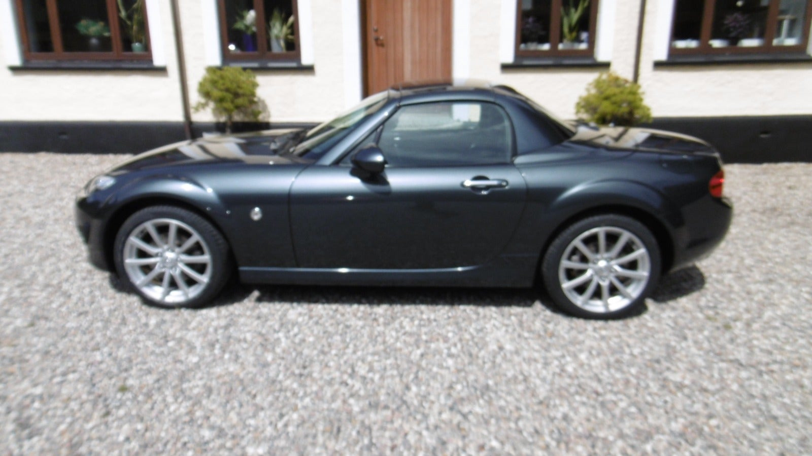 Grå Mazda MX-5 fra 2009