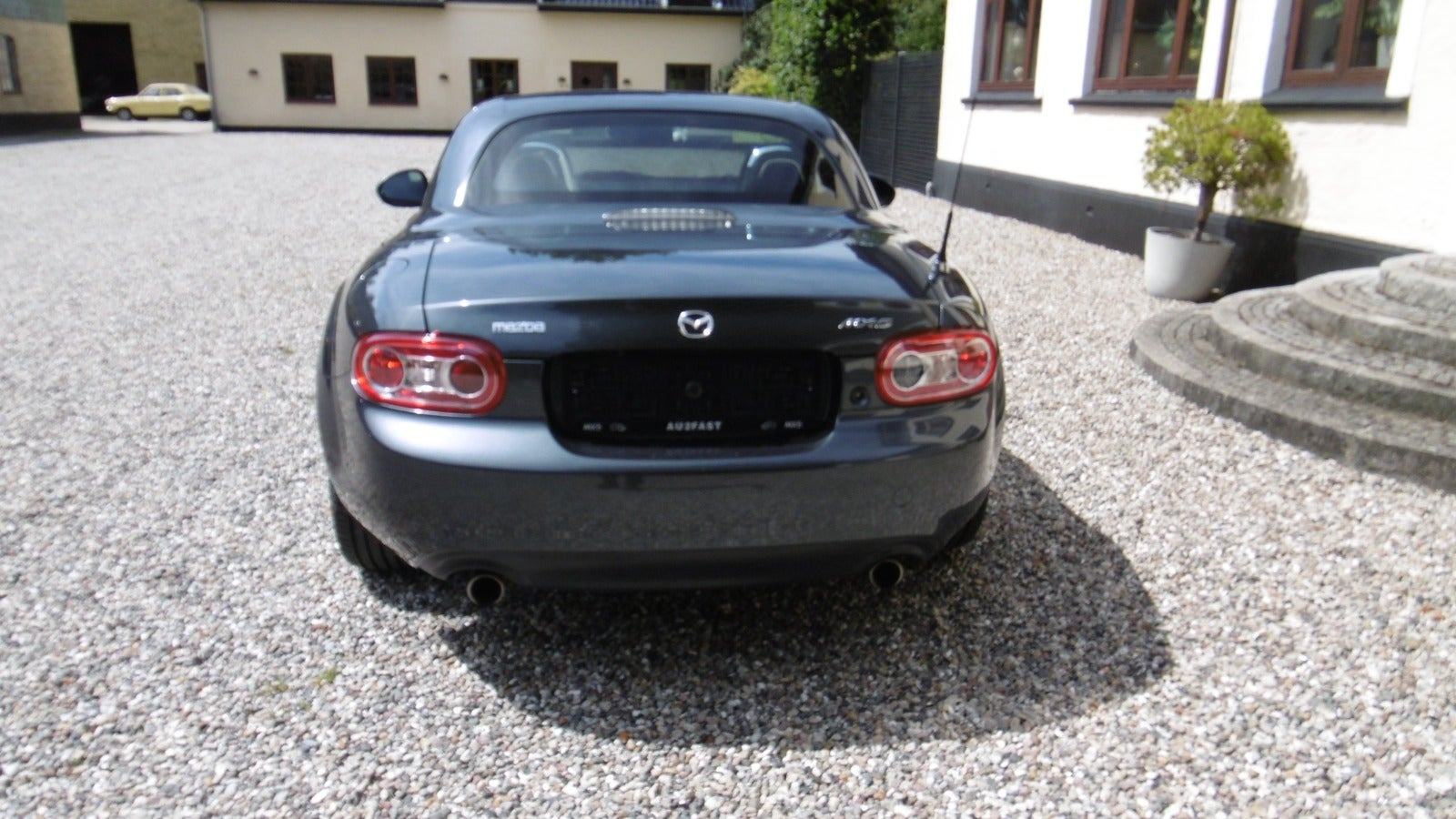 Grå Mazda MX-5 fra 2009