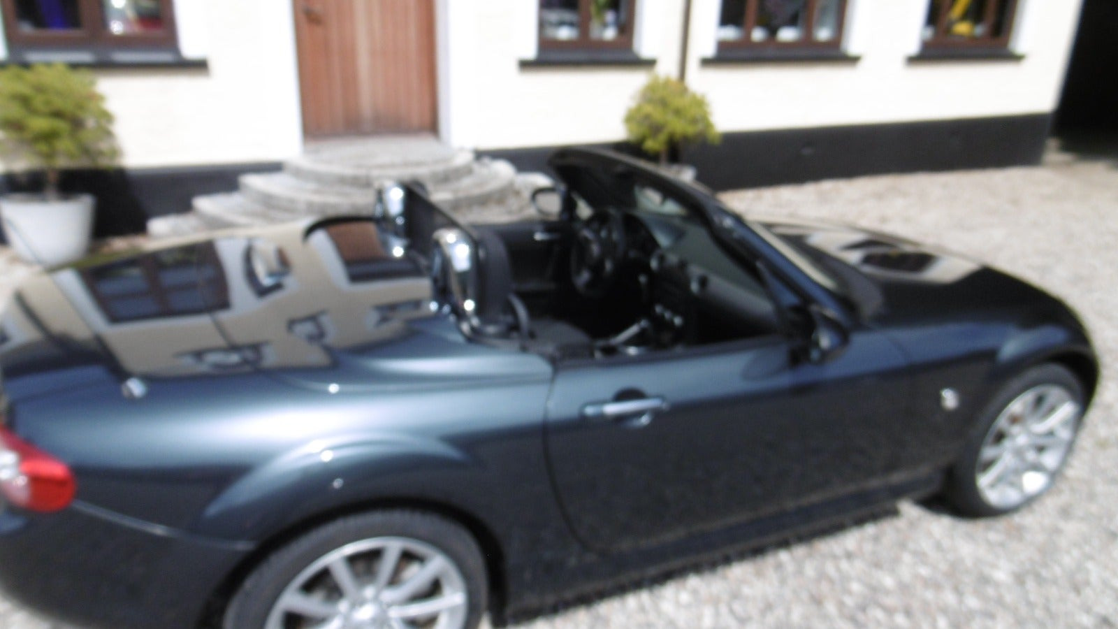 Grå Mazda MX-5 fra 2009