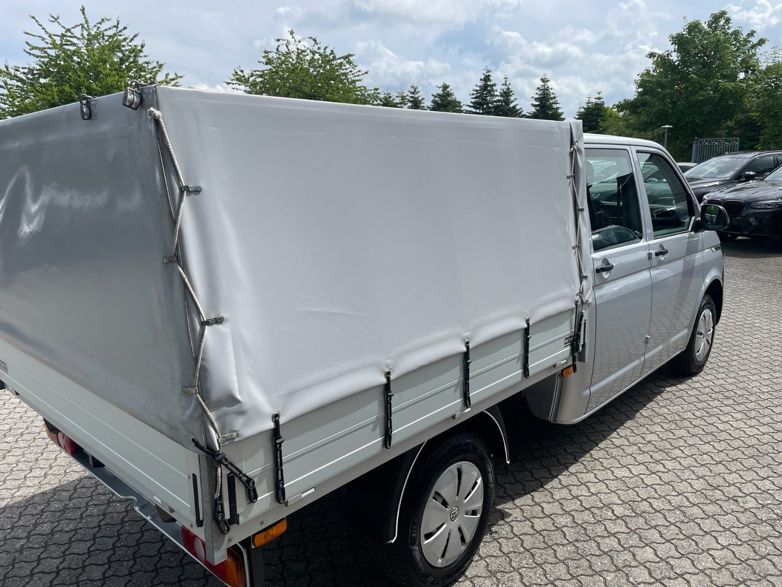 Sølv VW Transporter fra 2024