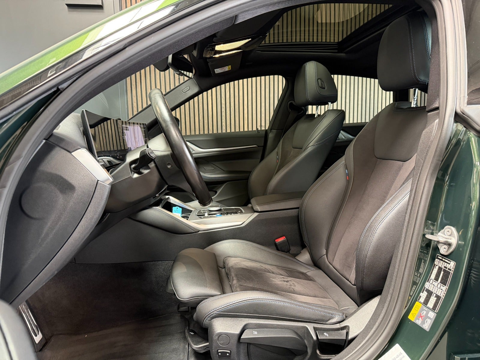 Grøn BMW i4 fra 2024