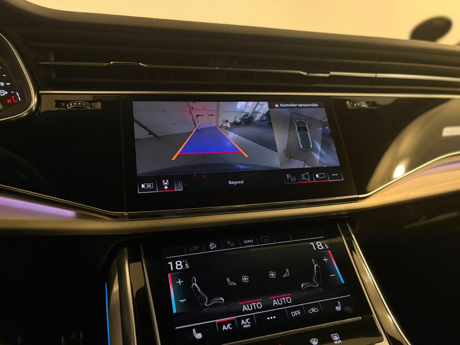 Grå Audi Q7 fra 2023