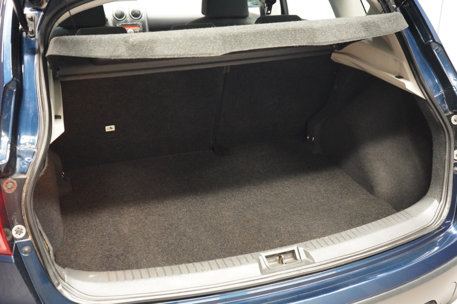 Blå Nissan Qashqai fra 2009