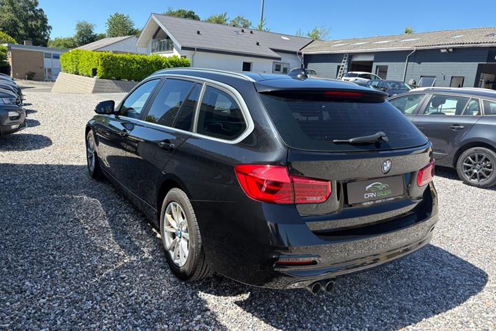 Sort BMW 320i fra 2018