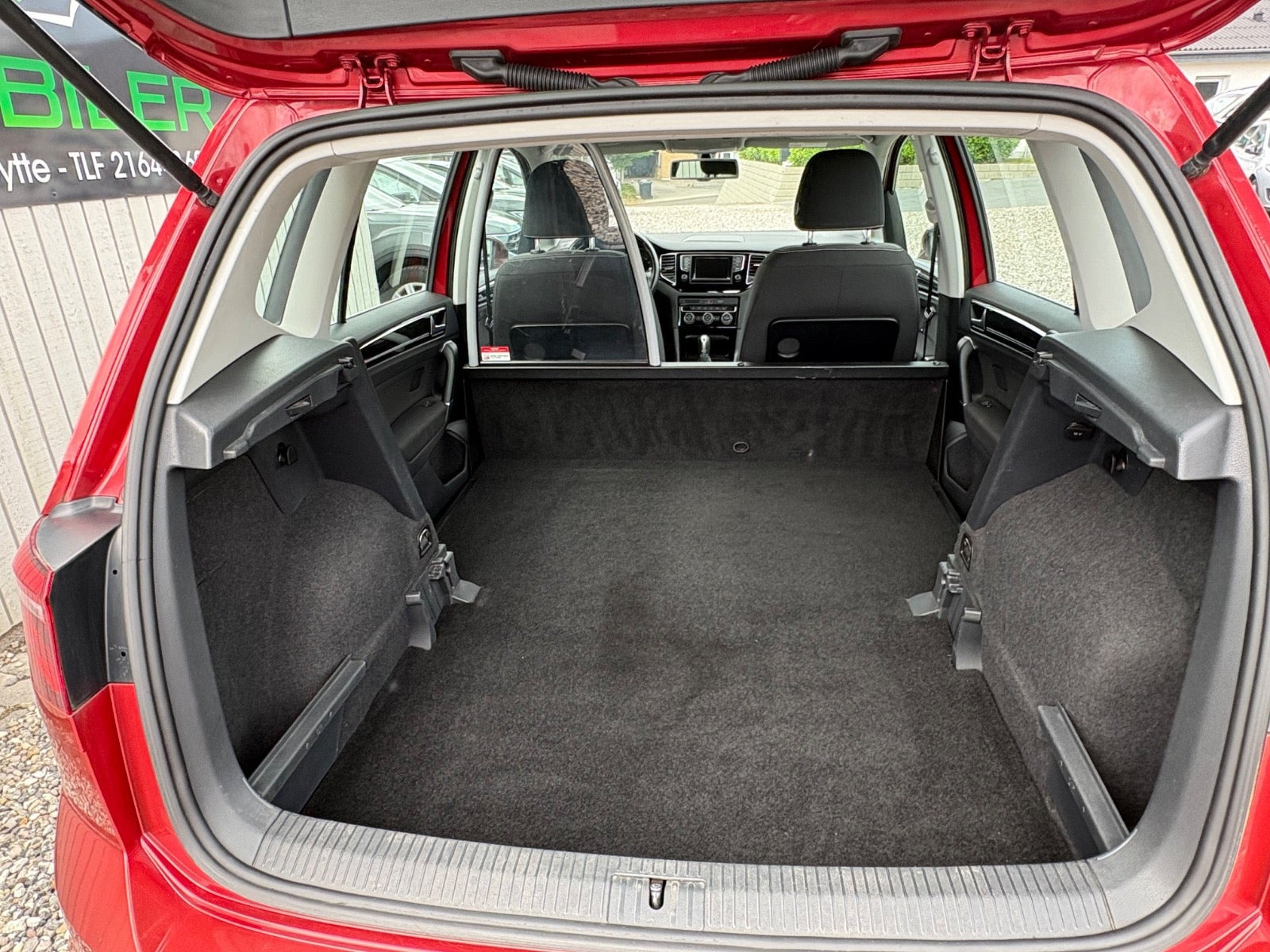 Rød VW Golf Sportsvan fra 2015